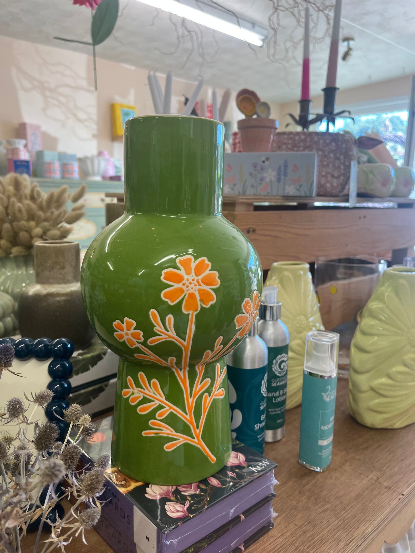 Green Vase with Orange Flower